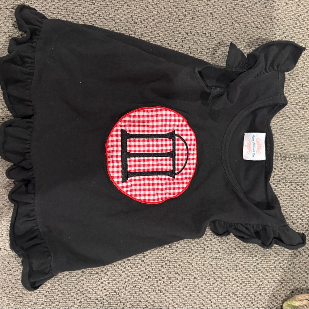Black Shirt with Red Checkered UGA arch Symbol
